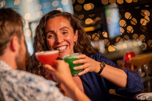 Couple at Bar with Food and Cocktails 31