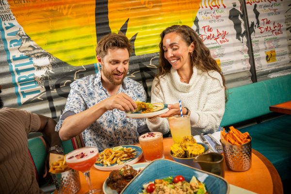 Group Couple Sharing Trini Doubles 7