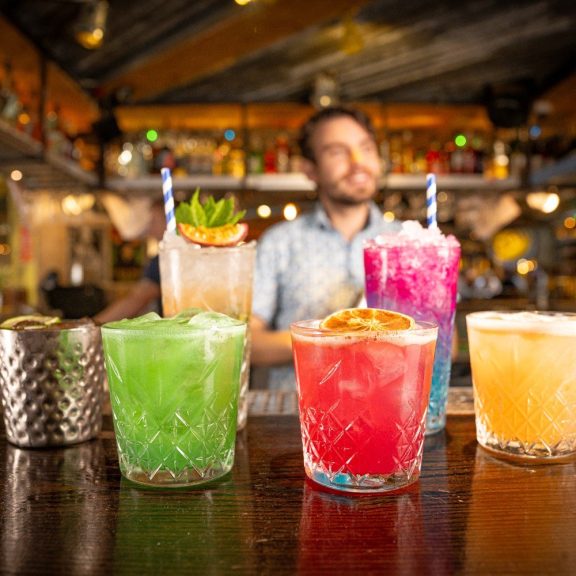 Colourful cocktails on bar
