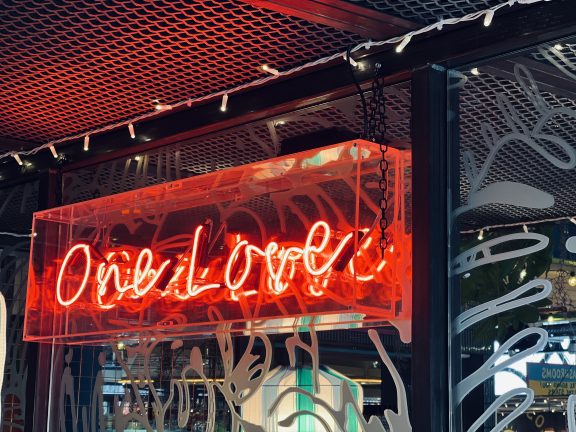 One Love neon sign at Coventry